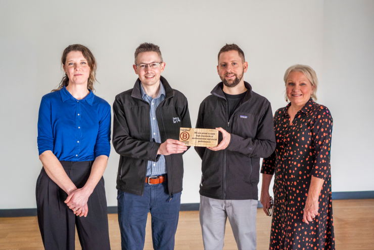 Photo of iCT4 staff holding the B Corp badge: Polly Menear, Glyn Pascoe, Josh Hosking and Brenda Boyling.